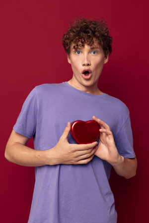 cute guy with curly hair valentine heart-shaped gift