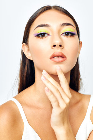 young woman white t shirt hand gestures charm Lifestyle unalteredの写真素材