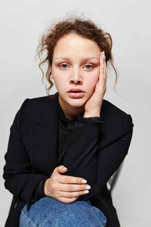 beautiful woman elegant style black blazer posing light background unaltered