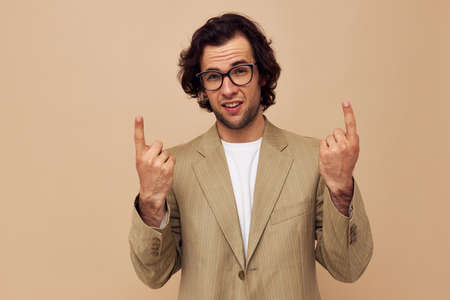 Attractive man with glasses emotions gesture hands posing Lifestyle unaltered