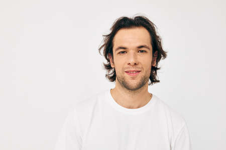 Attractive man in white t-shirt fashion cropped view Lifestyle unalteredの写真素材