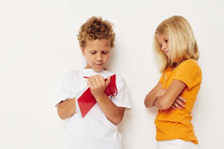 picture of positive boy and girl draw in the notebook childhood entertainment lifestyle unaltered