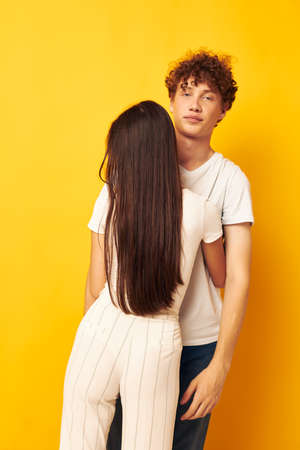 young boy and girl hug love emotion isolated background unaltered
