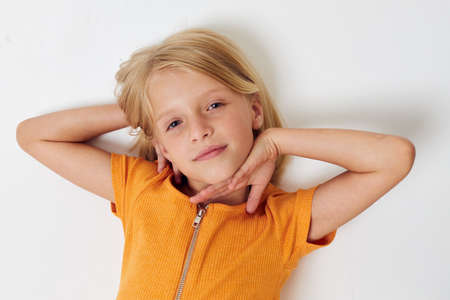 cheerful little girl in casual clothes childhood studio