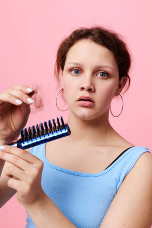 beautiful woman comb hair disgust hair loss isolated background unaltered