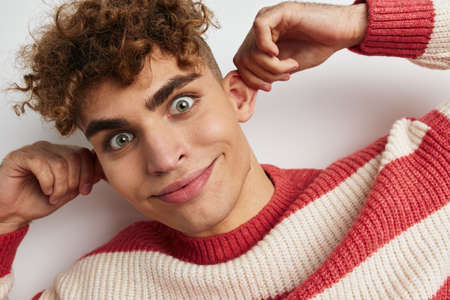 handsome young man teen fashion emotions Lifestyle unalteredの写真素材