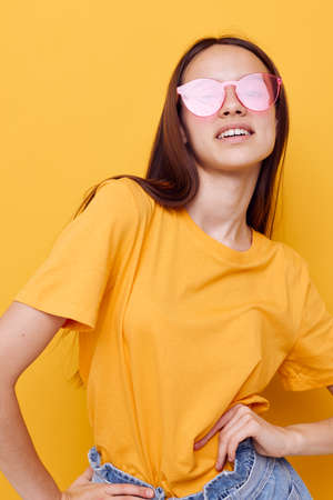 beautiful girl pink glasses Youth style casual wear isolated backgroundの写真素材