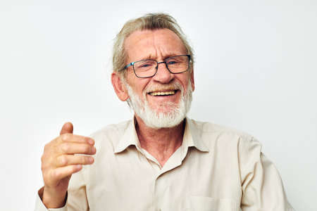 Photo of retired old man smile emotion hand gesture cropped viewの写真素材
