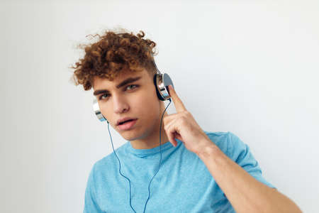 handsome guy in headphones music emotions Lifestyle unalteredの写真素材