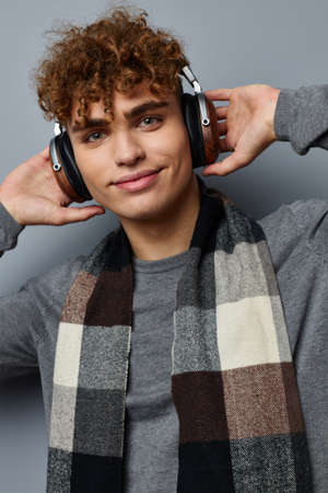 handsome guy fashion posing headphones Lifestyle unaltered