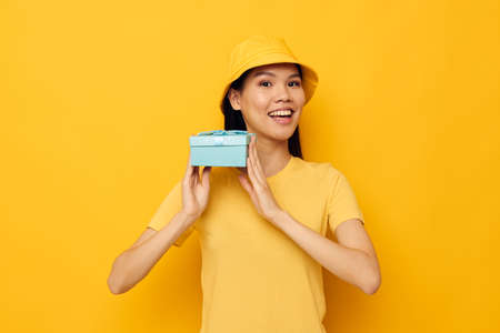 Portrait Asian beautiful young woman blue gift box holiday birthday Lifestyle unalteredの写真素材