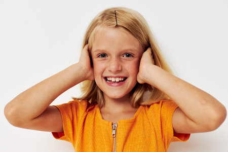 girl with blond hair gesture with hands posing close-up