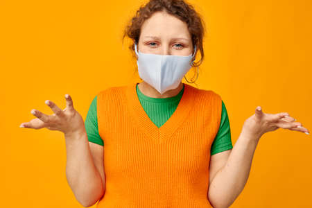 beautiful woman medical face mask grimace emotions close-up isolated backgrounds unaltered