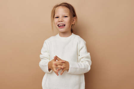 Portrait of happy smiling child girl childrens style emotions fun childhood unalteredの写真素材