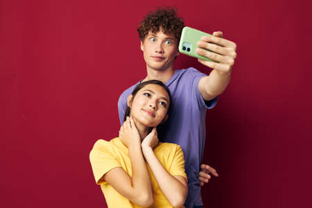 Man and woman take a selfie posing hug Lifestyleの写真素材