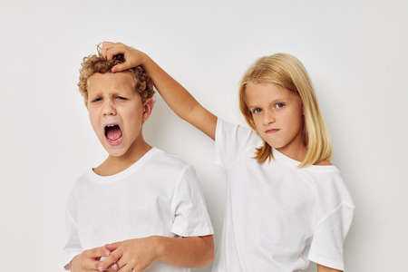 Little boy and girl Friendship posing together Lifestyle unalteredの写真素材