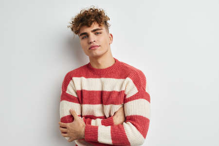 handsome guy hand gesture posing fun isolated backgroundの写真素材