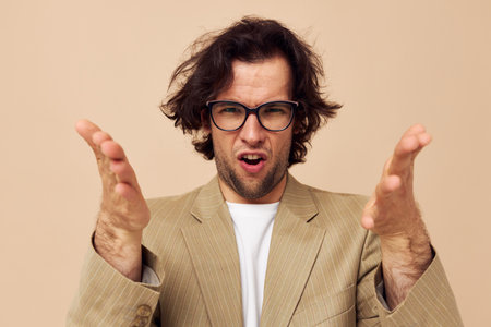 Cheerful man with glasses emotions gesture hands posing Lifestyle unaltered