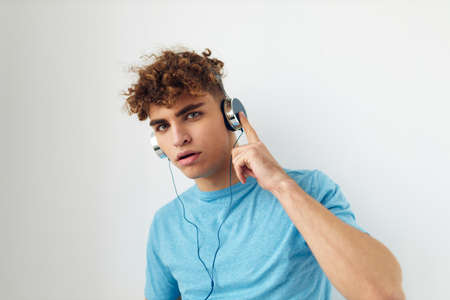 handsome guy in headphones music emotions Lifestyle unaltered