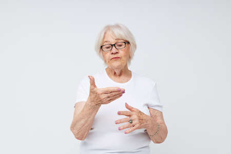 Photo of retired old lady vision problems with glasses close-upの写真素材