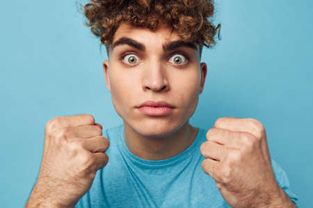 handsome young man emotions gesture hands posing isolated background
