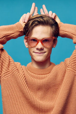 funny guy funny posing in female glassesの写真素材