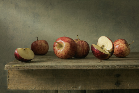 Still life with apples on wood tableの写真素材