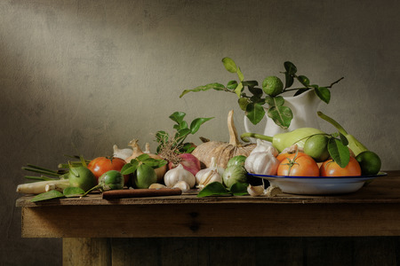 Still life with vegetables on wood tableの写真素材