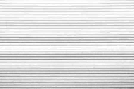 White roller shutter door backgroundの写真素材