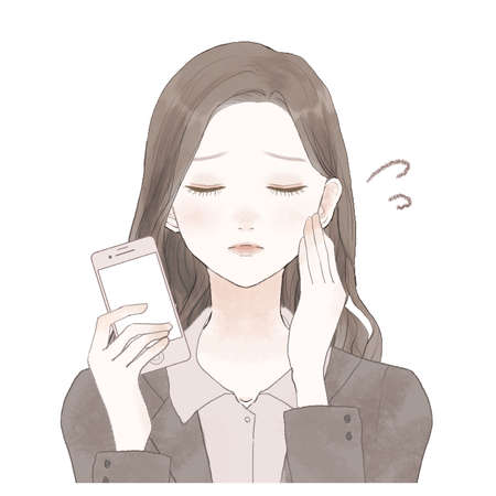 It is a woman in a suit who has a smartphone. I have a troubled expression.のイラスト素材