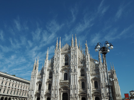 Milan Duomo Cathedral in Italy from public square with no people on sunny dayの写真素材