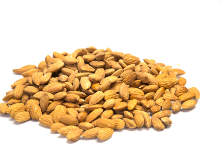 Pile of almonds on white background.の写真素材