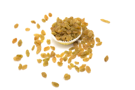 Dry organic raisins  bowl. Isolated on white background.の写真素材