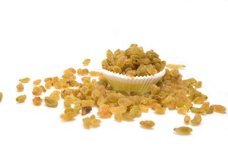 Bowl of sweet raisins  on white background.の写真素材