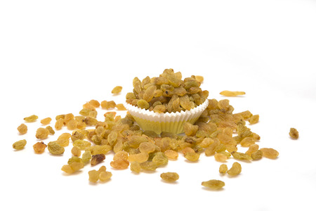Dry raisin bowl isolated on white background.の写真素材