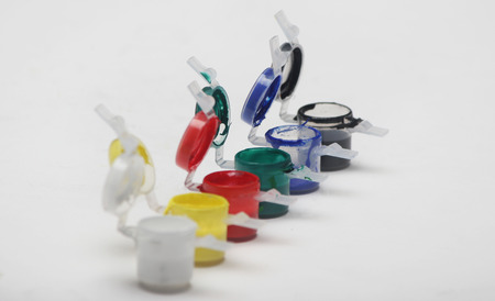 close up side view of six Watercolor paints  . Isolated on white background.の写真素材