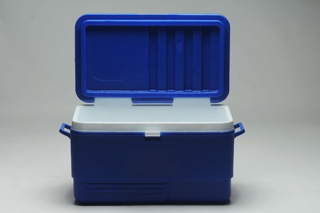 Open Handheld blue refrigerator, ice box. Isolated on white background. cooler