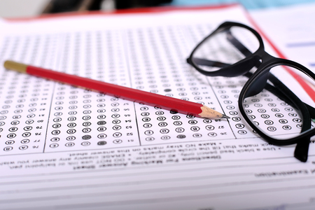 Picture of pencil and glasses on the OMR sheet.の写真素材