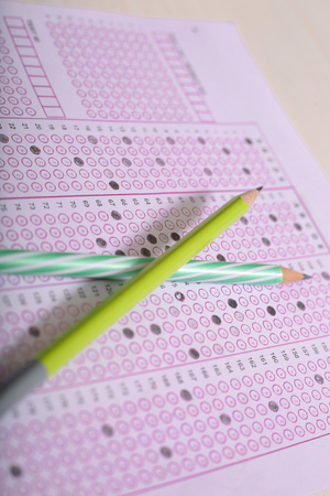 Picture of two colorful pencil on the OMR sheet.の写真素材