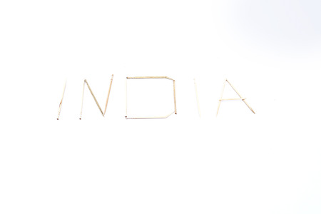 Photo of wooden toothpicks design. Isolated on the white background.