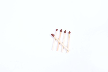 Picture of matchsticks with red head. Isolated on the white background.