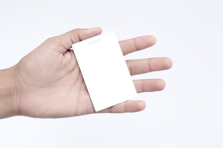 Man is showing tag card in hand. Isolated on the white background.