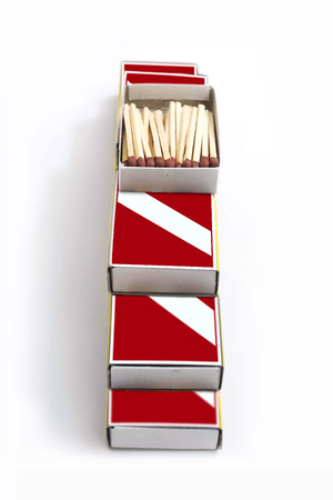 Portrait of matches in matches box. Isolated on the white background.
