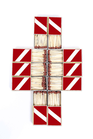 Portrait of matches in red matches box. Isolated on the white background.