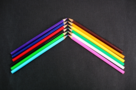 Picture of different colored pencils. Isolated on the black background.