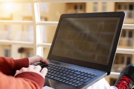 Picture of man is working on the laptop.の写真素材