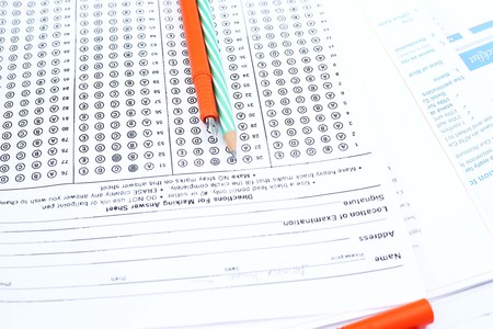 Picture of pen and pencil on the omr sheet.