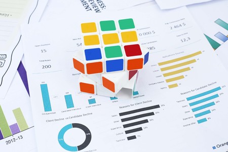 Picture of Rubik's cube on the financial paper.の写真素材
