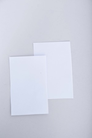 Picture of blank white card. Isolated on the white background.の写真素材