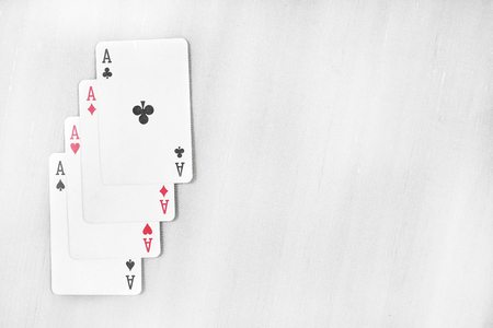 The combination of playing cards. Isolated on the grey background.の写真素材